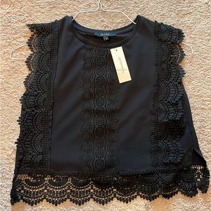 The perfect feminine crop top! Great for a dress-up or dress-down look.